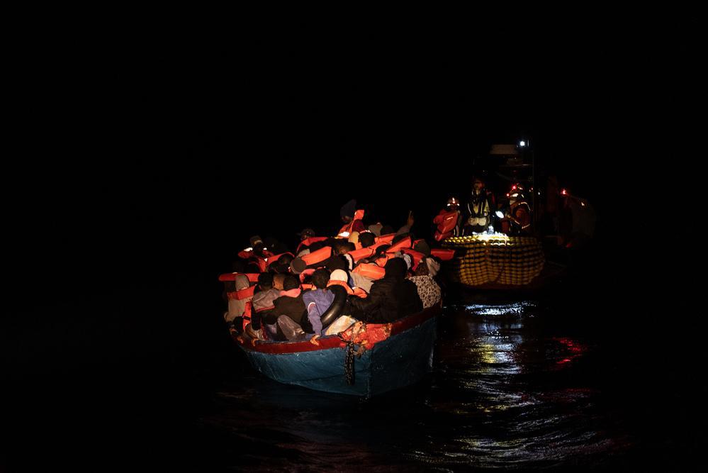 Following a distress alert from the Alarm Phone, a hotline for boatpeople in distress, the MSF team rescues 62 people from an overcrowded wooden boat in distress located the Libyan search and rescue region. (Geo Barents, November 2021, @Virginie Nguyen Hoang)