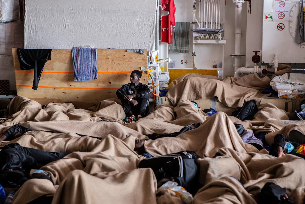 After 7 days stranded at sea, half of the 471 survivors are allowed to disembark in Augusta. The Italian authorities asked MSF to leave the dock with 233 people onboard, including people with broken limbs and a diabetic patient, without further explanation. (Geo Barents, May 2022, @Anna Pantelia)